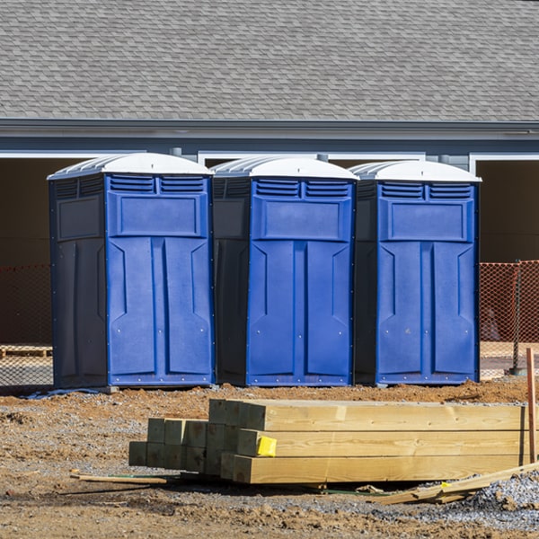 how often are the porta potties cleaned and serviced during a rental period in Parma